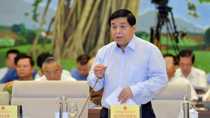 Bộ trưởng Bộ Kế hoạch và đầu tư Nguyễn Chí Dũng trả lời chất vấn - Ảnh: Quang Phúc 