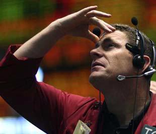 Thị trường chứng khoán Mỹ đã mất trên 22% trong tháng và giảm trên 40% so với tháng 10/2007 - Ảnh: Reuters.