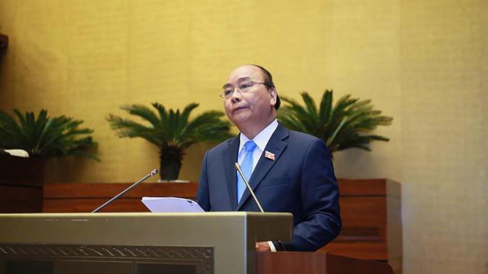 Thủ tướng Nguyễn Xuân Phúc trong một phiên chất vấn của Quốc hội - Ảnh: Quang Phúc 