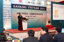Thống đốc Ngân hàng Nhà nước Nguyễn Văn Giàu phát biểu tại hội thảo - Ảnh: Trần Việt/TTXVN.