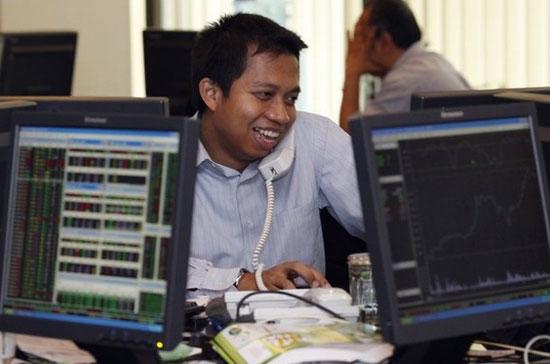 Giới đầu tư cổ phiếu ở châu Á đang cho thấy, họ đã tin tưởng hơn vào triển vọng phục hồi của kinh tế thế giới - Ảnh: Reuters.