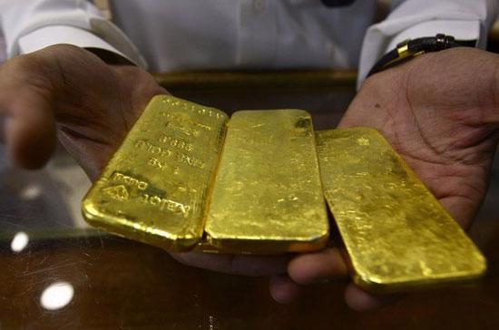 Dù thường xuyên lên xuống theo giá vàng thế giới, giá vàng trong nước từ đầu năm tới nay vẫn chưa thể bứt phá khỏi vùng 26-27 triệu đồng/lượng để tạo ra những diễn biến kịch tính như trong năm 2009 - Ảnh: Reuters.