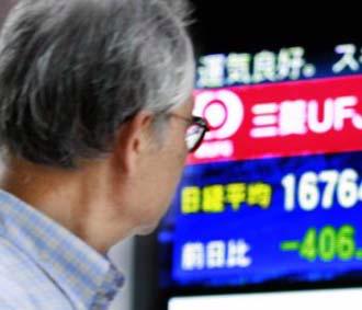 Thị trường châu Á cũng có những tín hiệu vui từ Nhật Bản, Trung Quốc và Hàn Quốc - Ảnh: AP.