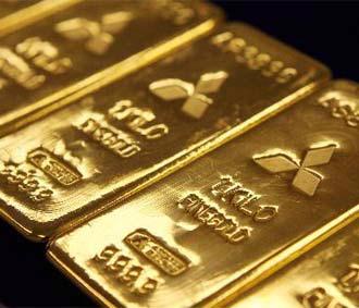 Giới đầu tư luôn coi vàng là một kênh hấp dẫn để đổ vốn trong trường hợp áp lực lạm phát tăng - Ảnh: Bloomberg.