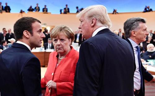 Tổng thống Pháp Emmanuel Macron lên tiếng phản đối quan điểm của ông Trump cho rằng nước Mỹ chịu thiệt hại về thương mại - Ảnh: Getty Images.