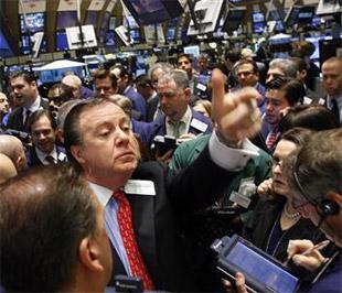 Chứng khoán Mỹ đã tăng điểm trở lại với biên độ dưới 1%, nhờ sự phục hồi của cổ phiếu khối tài chính - Ảnh: Reuters.