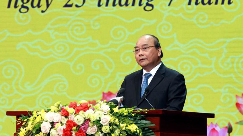 Thủ tướng Chính phủ Nguyễn Xuân Phúc tại buổi gặp mặt thương binh nặng ngày 25/7. Ảnh - Mạnh Dũng. 