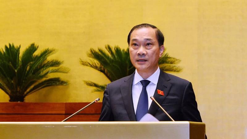 Chủ nhiệm Uỷ ban Kinh tế Vũ Hồng Thanh trình bày báo cáo thẩm tra - Ảnh: Quang Phúc 