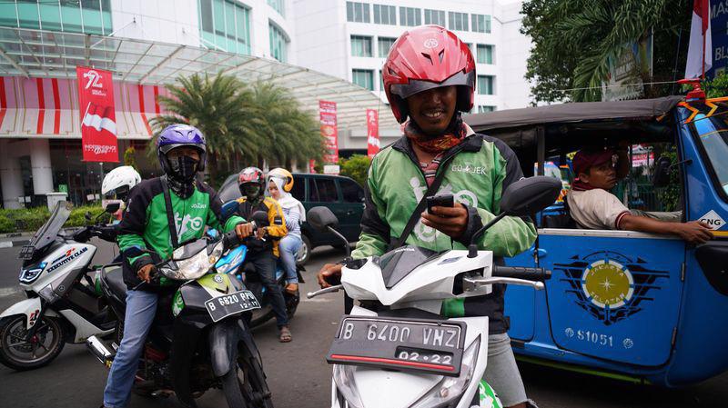 Xe ôm Go-Jek tại Jakarta - Ảnh: Bloomberg.