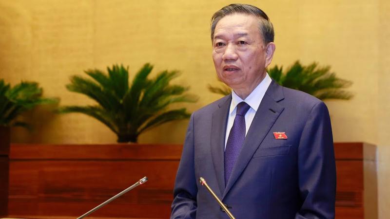 Bộ trưởng Bộ Công an Tô Lâm phát biểu trước Quốc hội - Ảnh: Quang Phúc 