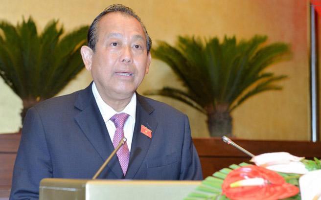 Phó thủ tướng Trương Hoà Bình báo cáo Quốc hội tình hình kinh tế - xã hội.