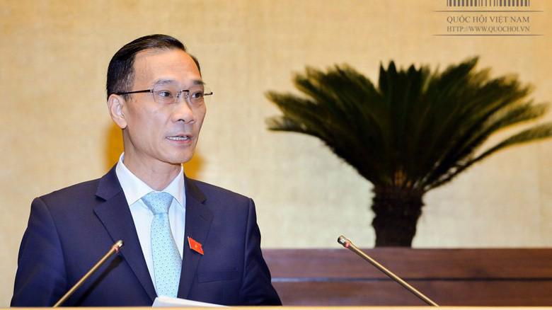 Chủ nhiệm Uỷ ban Kinh tế Vũ Hồng Thanh trình bày báo cáo thẩm tra tình hình kinh tế - xã hội.