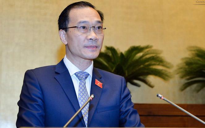 Chủ nhiệm Uỷ ban Kinh tế Vũ Hồng Thanh trình bày báo cáo thẩm tra dự án Luật Quy hoạch.
