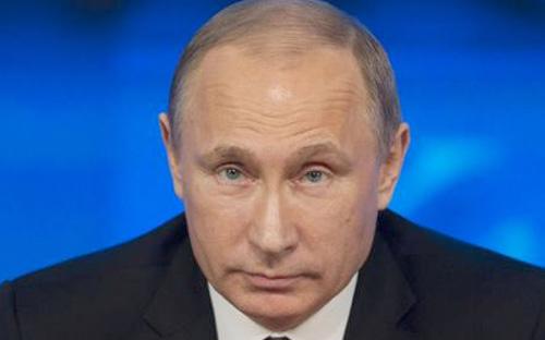 Tổng thống Nga Vladimir Putin phát biểu trong cuộc họp báo thường niên ngày 18/12 ở Moscow - Ảnh: AP.<br>