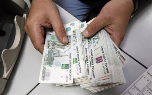 Đến ngày hôm qua, tỷ giá Rúp đã phục hồi lên mức 52 Rúp đổi 1 USD từ mức thấp kỷ lục hơn 80 Rúp "ăn" 1 USD vào tuần trước - Ảnh: Reuters.<br>
