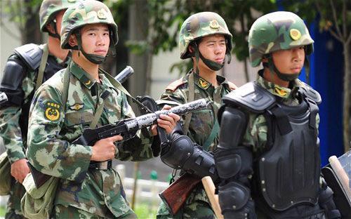 Lực lượng cảnh sát vũ trang Trung Quốc tại Urumqi, thủ phủ&nbsp; của khu tự trị Duy Ngô Nhĩ Tân Cương - Ảnh: News.