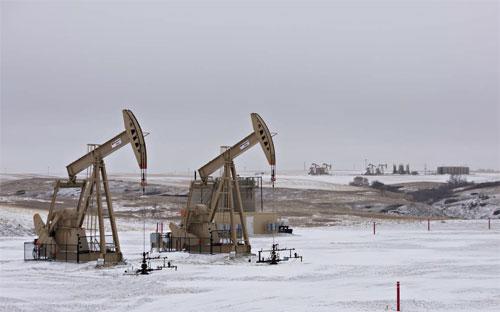 Khai thác dầu ở North Dakota, Mỹ - Ảnh: Bloomberg/WSJ.<br>
