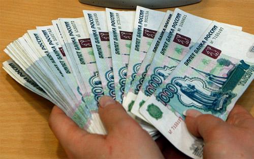 Đồng Rúp đã mất giá 14% so với đồng USD trong quý 3, trở thành đồng tiền có mức giảm giá tệ nhất thế giới - Ảnh: RT.<br>