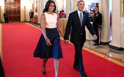 Tổng thống Mỹ Barack Obama và đệ nhất phu nhân Michelle - Ảnh: BI.<br>