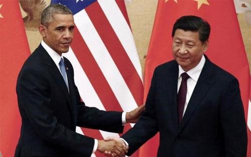 Tổng thống Mỹ Barack Obama (trái) và Chủ tịch Trung Quốc Tập Cận Bình tại Bắc Kinh tháng 11/2014 - Ảnh: Reuters.<br>