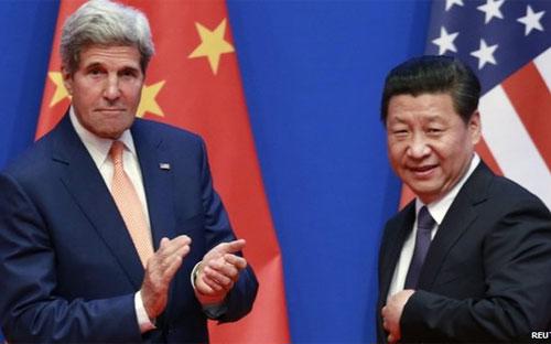 Ngoại trưởng John Kerry (trái) gặp Chủ tịch Trung Quốc Tập Cận Bình - Ảnh: Reuters.<br>