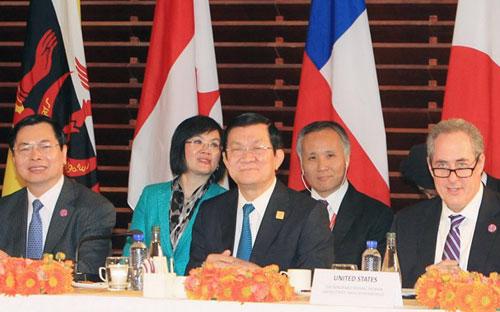 Chủ tịch nước Trương Tấn Sang dẫn đầu đoàn Việt Nam tham dự Hội nghị APEC 2014 tại Bắc Kinh, Trung Quốc - Ảnh: TTXVN.<br>