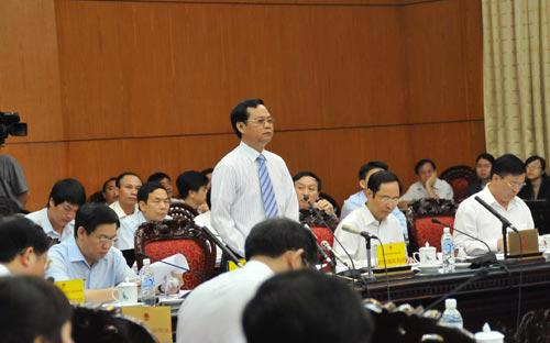 Tổng thanh tra Chính phủ Huỳnh Phong Tranh trong một phiên trả lời chất vấn đại biểu Quốc hội - Ảnh: MD.<br>