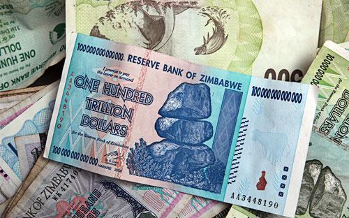Tờ 100.000 tỷ Đôla Zimbabwe - Ảnh: AP/Bloomberg.<br>
