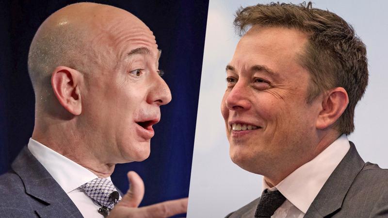 Hai tỷ phú giàu nhất thế giới Jeff Bezos (trái) và Elon Musk.