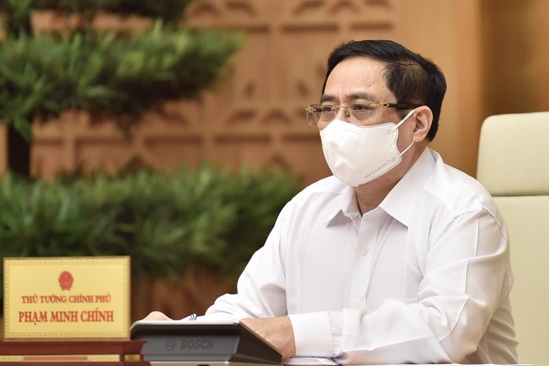 Thủ tướng Phạm Minh Chính tại cuộc họp khẩn với tỉnh Bắc Ninh và Bắc Giang - Ảnh: VGP