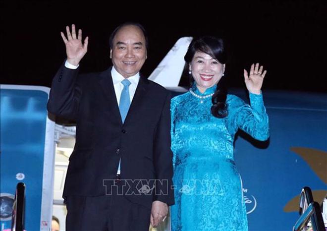 Chủ tịch nước Nguyễn Xuân Phúc và phu nhân - Ảnh: TTXVN