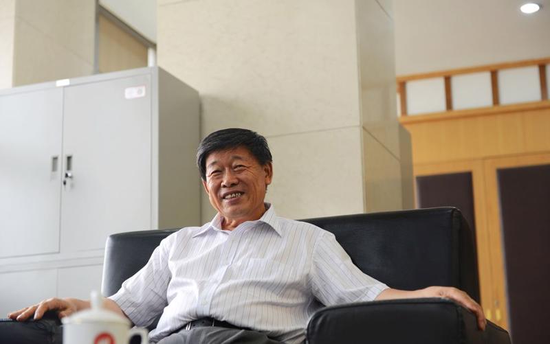 Tỷ phú Zhang Shiping vào năm 2013 - Ảnh: AP.