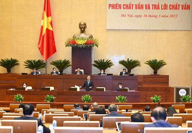 Bộ trưởng Bộ Tài nguyên và Môi trường Trần Hồng Hà trả lời chất vấn của đại biểu Quốc hội - Ảnh: Quochoi.vn