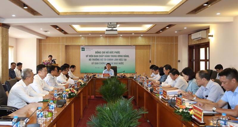 The working session between Minister of Finance Ho Duc Phoc and the State Securities Commission.