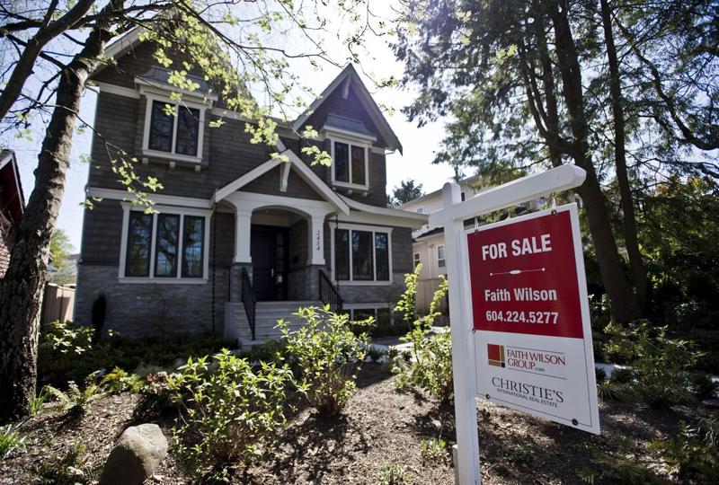 Một căn nhà được rao bán ở Canada - Ảnh: Bloomberg.