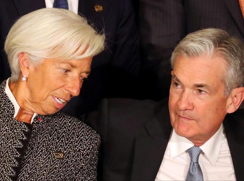 Chủ tịch ECB Christine Largarde (trái) và Chủ tịch Fed Jerome Powell - Ảnh: Reuters.
