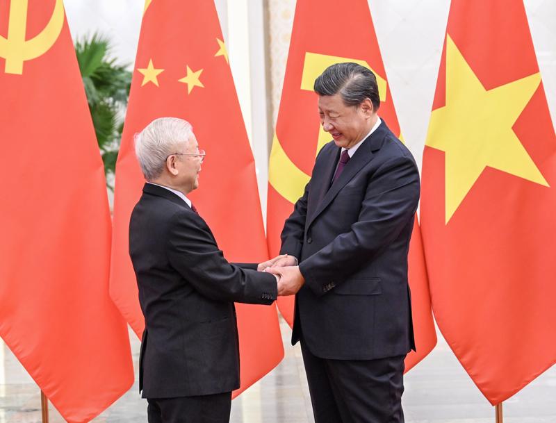 Tổng Bí thư Nguyễn Phú Trọng và Tổng Bí thư, Chủ tịch Trung Quốc Tập Cận Bình - Ảnh: TTXVN