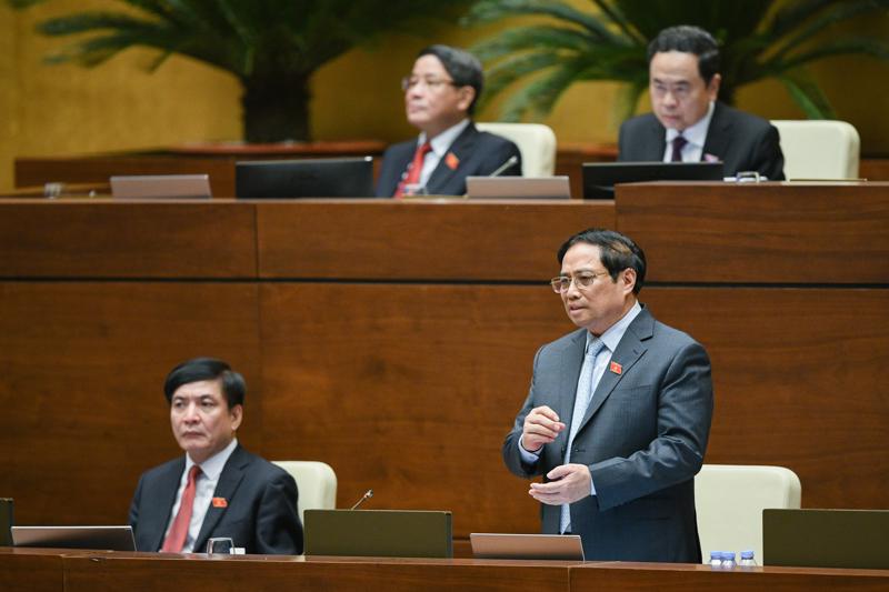 Thủ tướng Chính phủ Phạm Minh Chính báo cáo giải trình và trả lời chất vấn trước Quốc hội - Ảnh: Quochoi.vn.