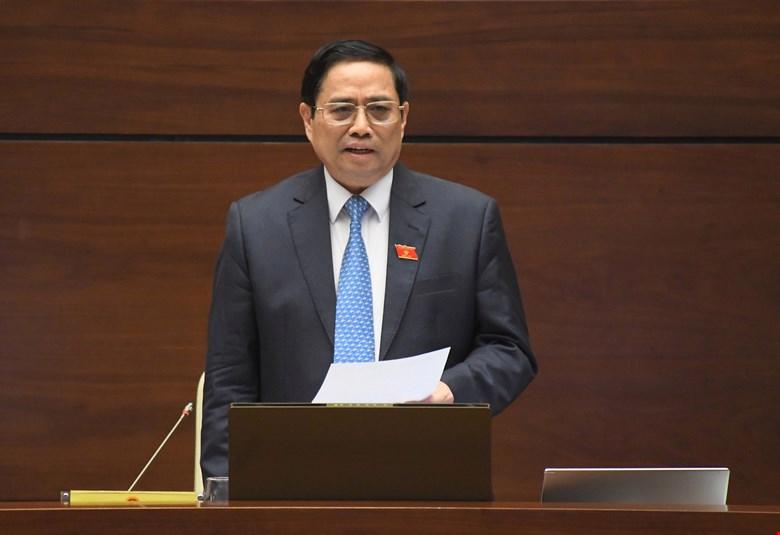 Thủ tướng Phạm Minh Chính tại một phiên trả lời chất vấn tại Quốc hội - Ảnh: Quochoi.vn