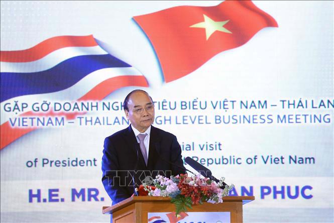 Chủ tịch nước Nguyễn Xuân Phúc phát biểu tại buổi gặp gỡ doanh nghiệp tiêu biểu Việt Nam - Thái Lan - Ảnh: TTXVN