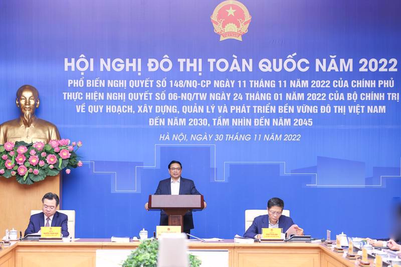 Prime Minister Pham Minh Chinh addresses the national urban conference in Hanoi on November 30.