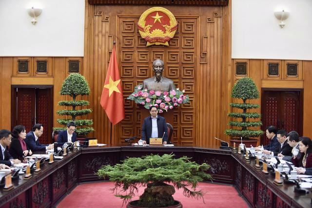 Prime Minister Pham Minh Chinh chairs the government’s meeting on fiscal, monetary, and macroeconomic policies on December 6.