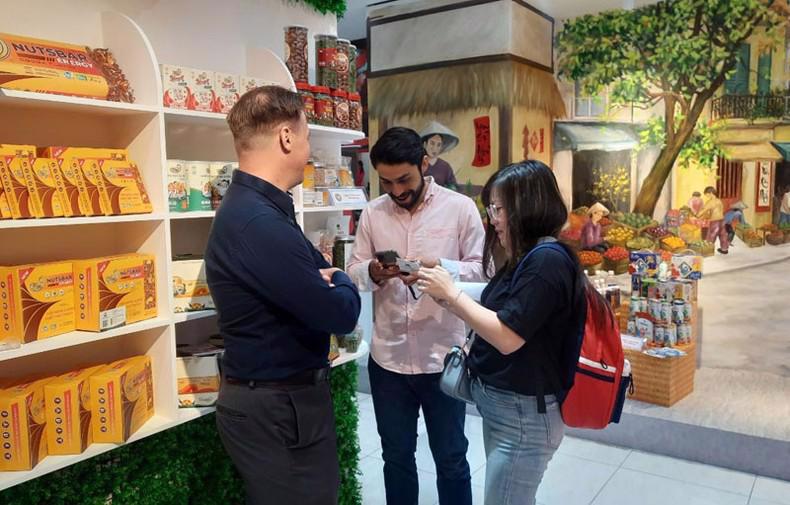 Representatives from Mexican businesses visit a booth showcasing Vietnamese products in Ho Chi Minh City.