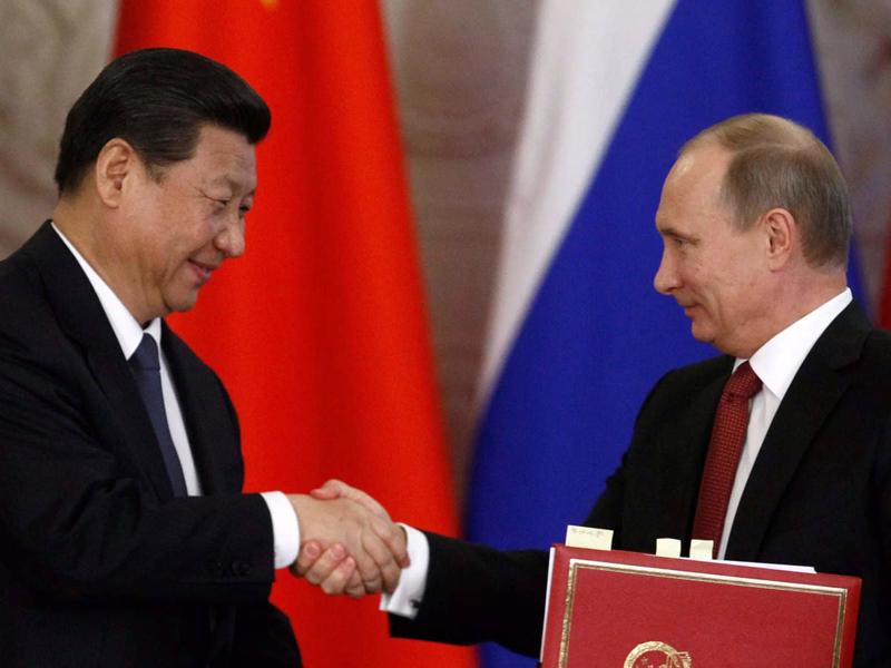 Chủ tịch Trung Quốc Tập Cận Bình và Tổng thống Nga Vladimir Putin - Ảnh: Reuters