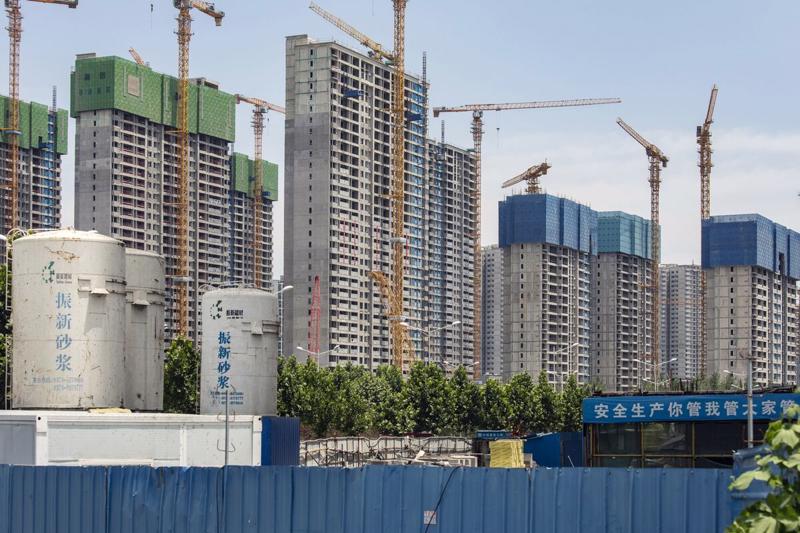 Ngành bất động sản của Trung Quốc đã tránh được một vụ sụp đổ sau 3 năm áp đặt các biện pháp hà khắc để phòng dịch Covid-19 - Ảnh: Getty Images