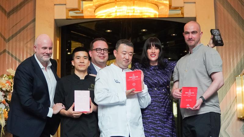 Representatives from Capella Hanoi celebrate their Michelin-Star Triumph. From left to right: Mr. Cristiano Rinaldi, Chef Tong Dang Khoai, Mr. Dennis Laubenstein (GM), Chef Hiroshi Yamaguchi (One-star Michelin), Ms. Hannah Loughlin, and Chef Marcus Benjamin Meek. Photo: Capella Hanoi