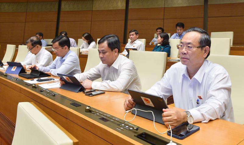  Quốc hội thảo luận tại hội trường về dự án Luật Căn cước công dân (sửa đổi), chiều 22/6. Ảnh - Quochoi.vn.