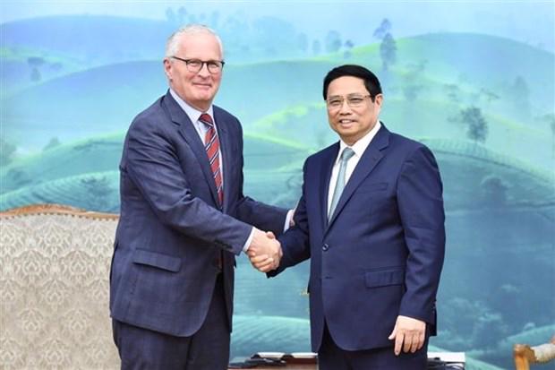 Prime Minister Pham Minh Chinh and President of the US Semiconductor Industry Association John Neuffer in Hanoi. (Photo: VNA)