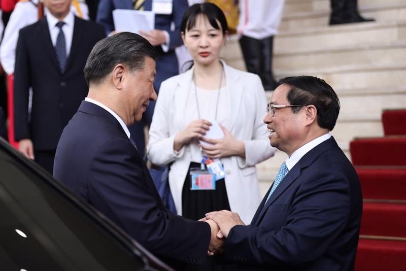Thủ tướng Phạm Minh Chính đónTổng Bí thư, Chủ tịch nước Trung Quốc Tập Cận Bình - Ảnh: VGP.