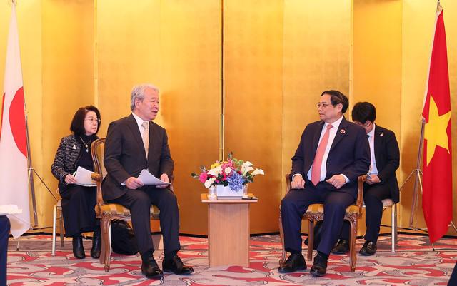 Prime Minister Pham Minh Chinh and JICA President Tanaka Akihiko during their meeting on December 18. (Photo: VGP)